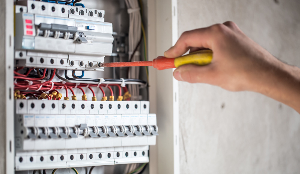 technician checking circuit breaks