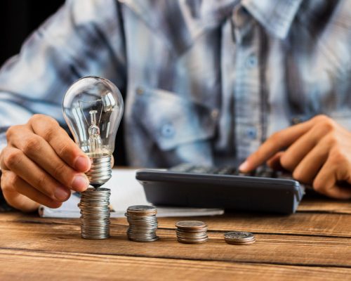 Person calculating electricity costs